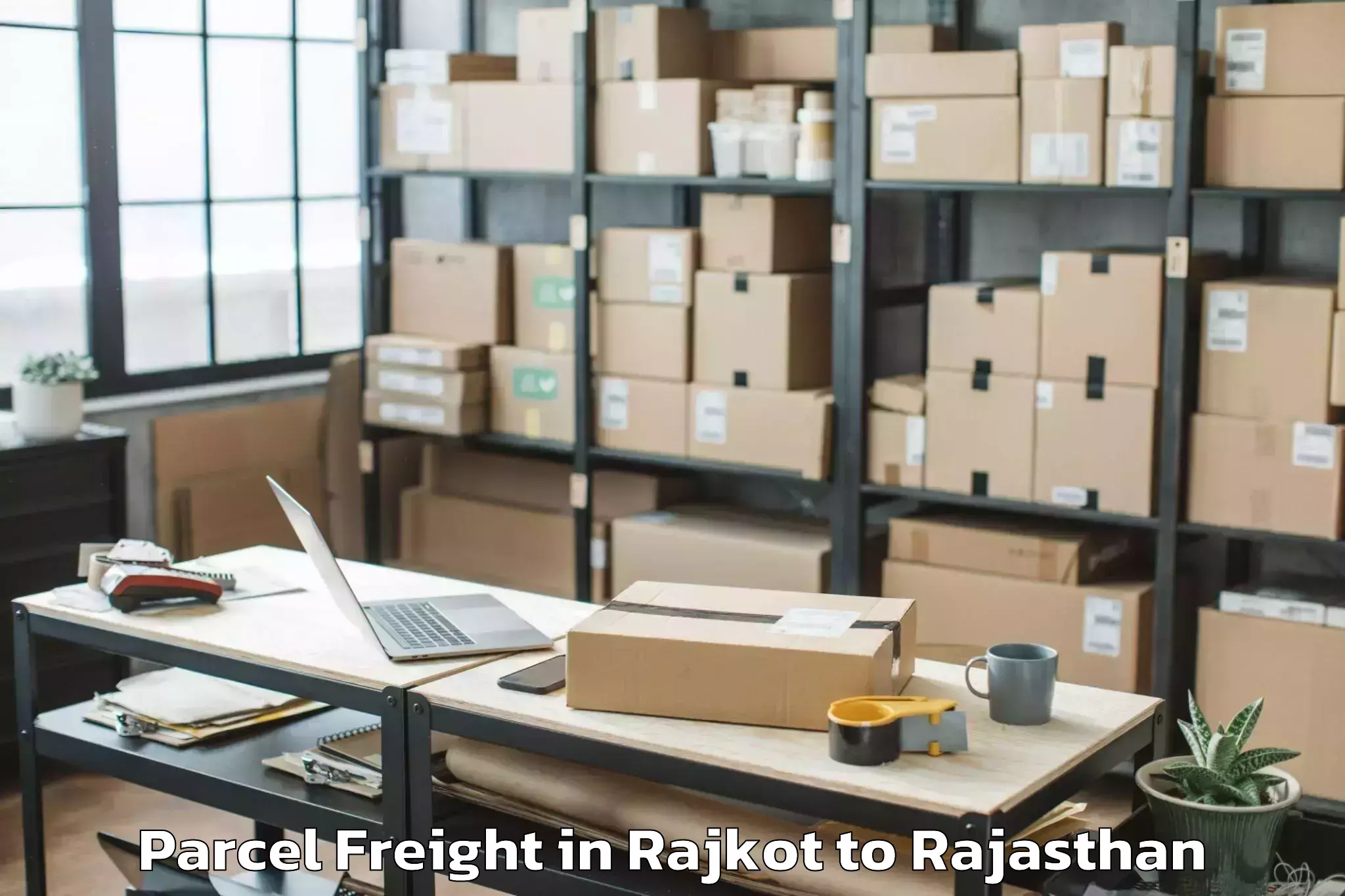 Affordable Rajkot to Maharaja Ganga Singh Universit Parcel Freight